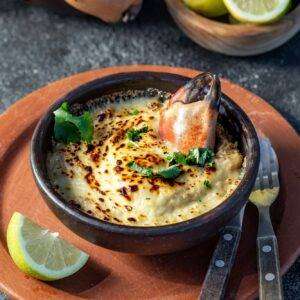 CHILEAN FOOD. Baked crabmeat crab meat with cheese, cream and bread. Traditional dish of chilean