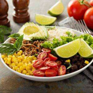 Mexican salad bowl with rice and pulled pork