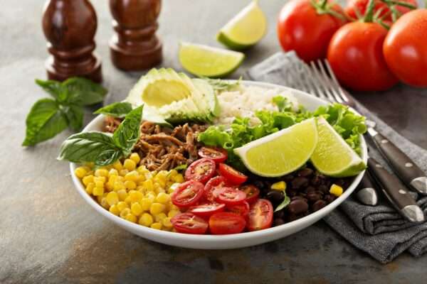 Mexican salad bowl with rice and pulled pork