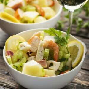 salad with seafood, potato and celery